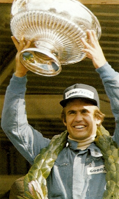 Carlos Reutmann's celebrates victory at the 1974 South African GP