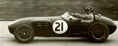 Graham Hill behind the wheel of a Lotus Mk 12 single seater, first used in Formula Two in 1957