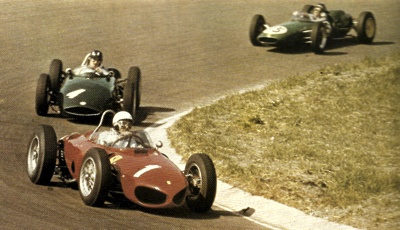 Phil Hill's Ferrari leads Graham Hill's BRM