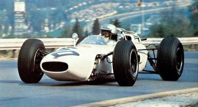 Richie Ginther behind the wheel of his 1.5 liter Honda V12 during the 1965 Belgian Grand Prix at Spa