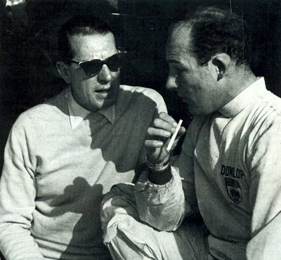 Rob Walker talks with his most successful driver, Stirling Moss